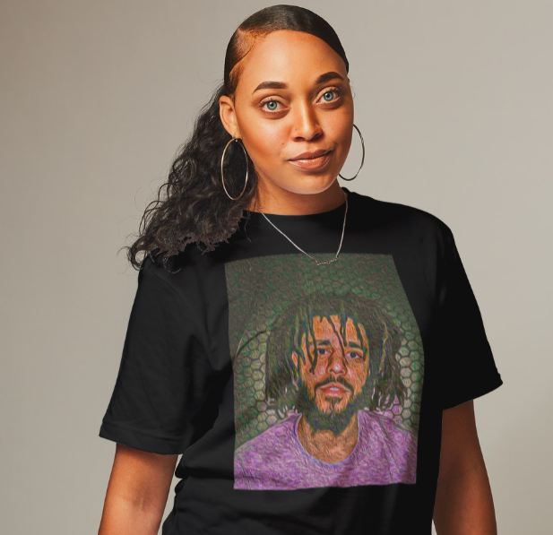 a woman is wearing our j cole graphic tee in black