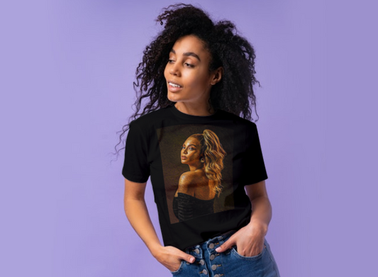 the woman pictured is modeling our beyonce graphic tee in black, the tee has a dark brown background