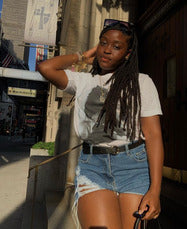 (2/2) our brand ambassador wearing our sza graphic tee in white